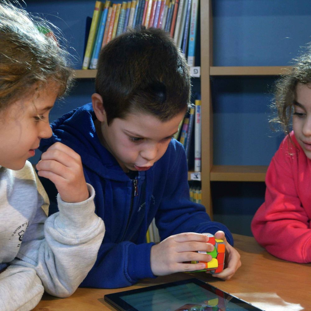 kid playing with Smart Cube