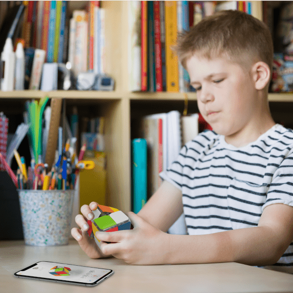 a boy playing in Rubik's Cube Game