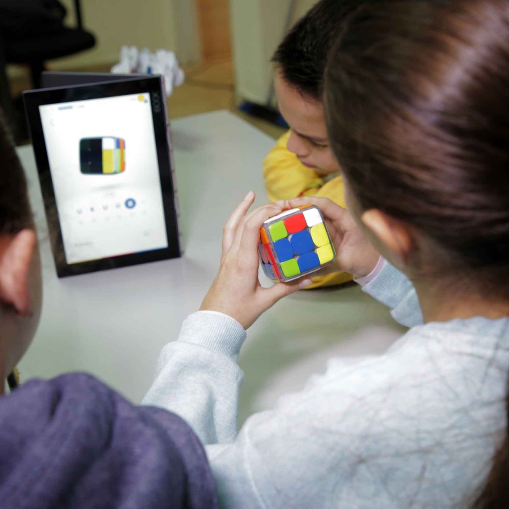 kids playing with Smart Rubik's Cube