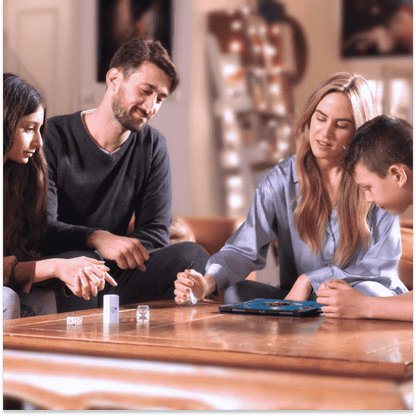 family playing board game with smart connected dice set