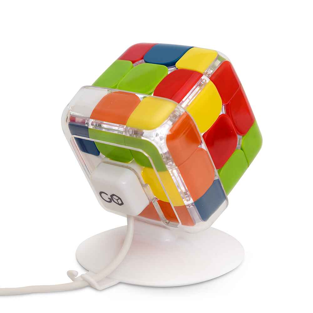 Charging Smart Rubik's Cube on charging stand 