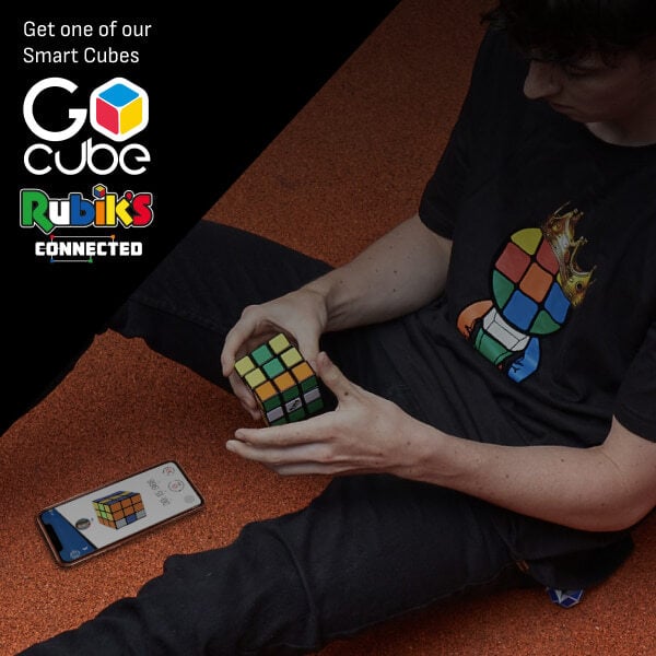 Boy Playing Rubiks Cube